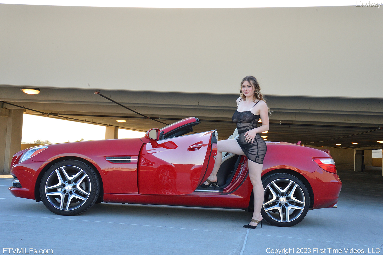 Lindsay In Naughty Garage Looks