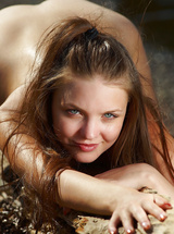 Sweet blonde teen posing nude on the beach
