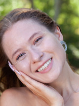 Skye Bloom Perching On A Picnic Table In The Park