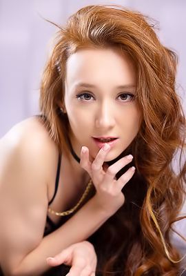 Alice Mido Wearing Nothing But The Garter Straps That Encircle Her Slender Thighs