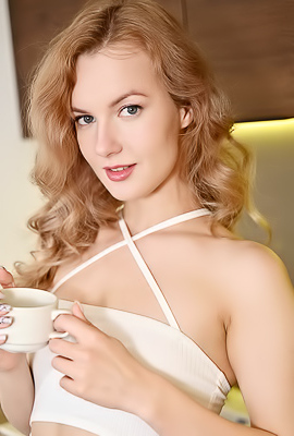 Luna Art Teasingly Lifts Her Dress Revealing Bare Pussy And Perky Breasts Indoors