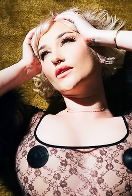 I Confess: Skye Blues Tattooed Thighs Peek Through Fur-Trimmed Lingerie
